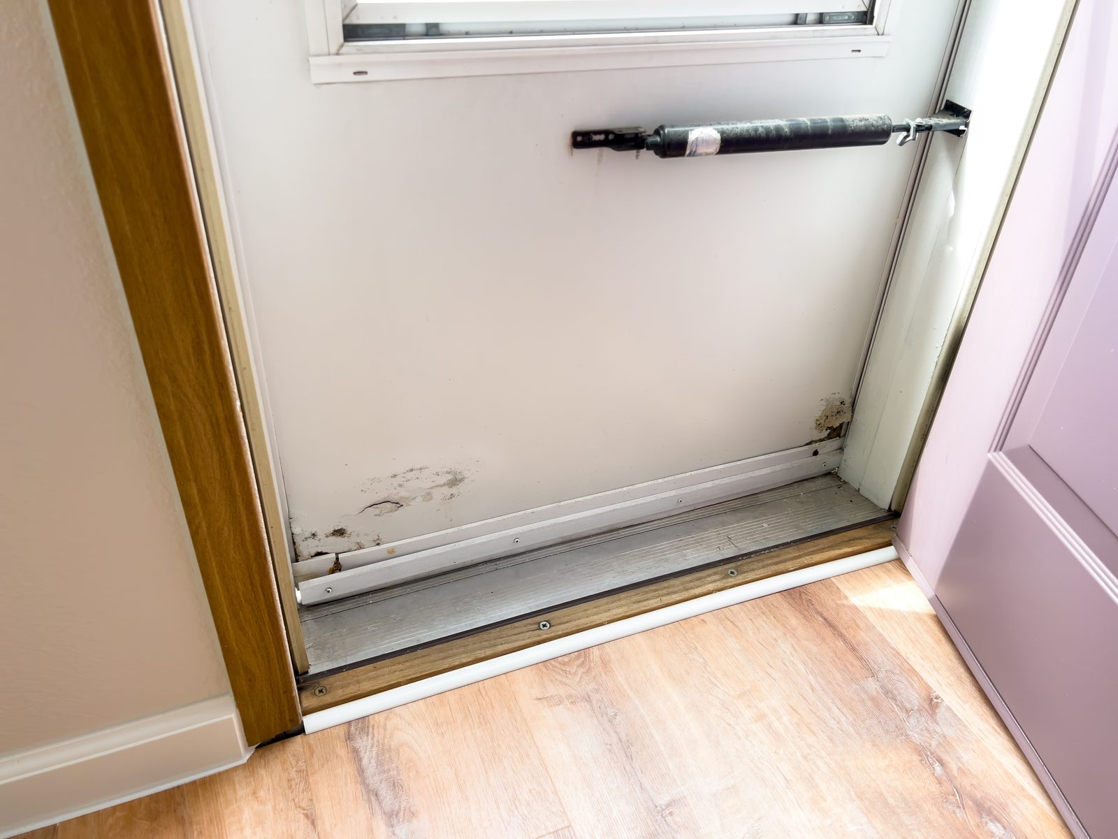 Door frame damaged by forced entry in Ottawa