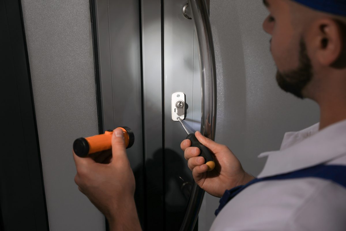 Working a door lock at night in Ottawa